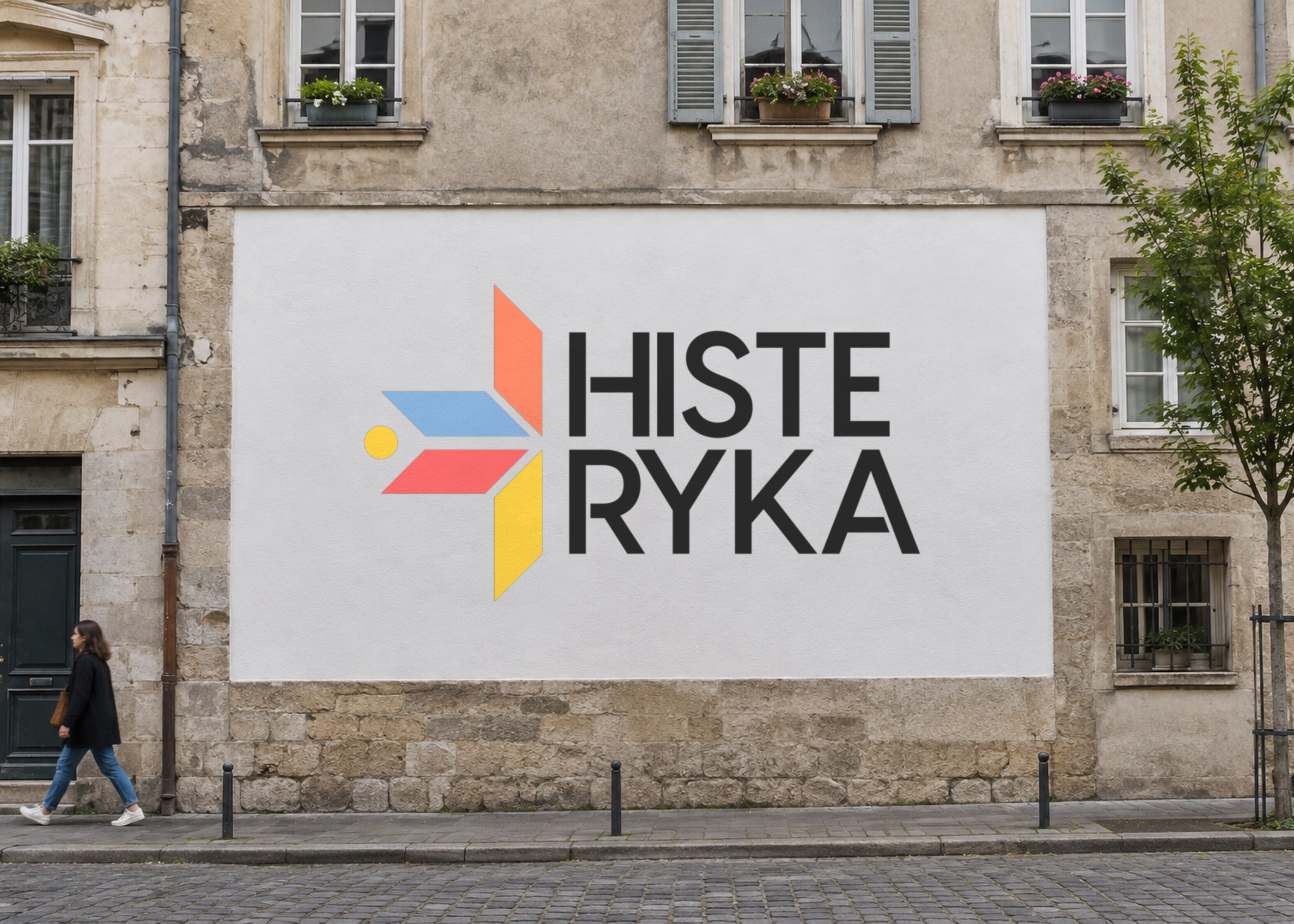 The logo painted on a house wall in an old town